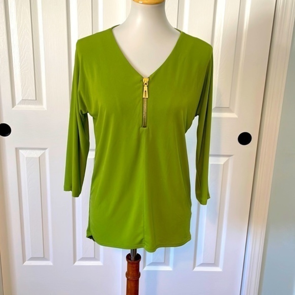Premise studio green long sleeve blouse. High-low cut with gold zipper on front.